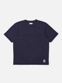 The Navy Recycled/Bio Jersey Core Pocket Tee is shown as a flat lay against a white background. The t-shirt features a classic crew neck, short sleeves, and a single patch pocket on the left chest. The fabric is a smooth, dark navy jersey.