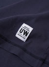 The Navy Recycled/Bio Jersey Core Pocket Tee is shown from the back as a flat lay against a plain white background. The image highlights the smooth texture of the navy blue jersey fabric, the short sleeves, and the ribbed crew neckline.