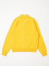The Yellow Eco Cotton Knit Pocket David Cardigan is shown from the back as a flat lay against a plain white background. The image highlights the textured yellow knit fabric, a simple straight hem, and clean-finished seams at the shoulders and sleeves.