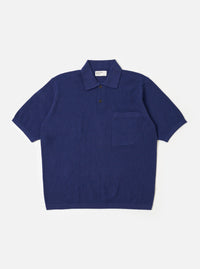 The Navy Fine Texture Tricot S/S Knit Polo is shown as a flat lay against a plain white background. The polo features a classic three-button placket, a structured collar, and short sleeves. The navy blue cotton fabric has a visible fine-textured tricot knit pattern throughout.