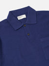 The Navy Fine Texture Tricot S/S Knit Polo is shown from the back as a flat lay against a plain white background. The image highlights the fine-textured knit fabric, the ribbed hem, and the short sleeves.