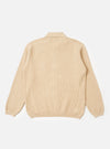 The Sand Eco Cotton Knit Jacket is shown from a rear angle as a flat lay against a white background. The jacket features long sleeves, a straight hem, and ribbed detailing at the cuffs and hem. The knitted fabric has a textured appearance.