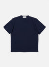 The Navy Merino Fine Knit Knit Tee is displayed as a flat lay against a white background. The short-sleeved garment features a crew neck, ribbed cuffs, and a ribbed hem. The fine merino wool knit provides a smooth, uniform texture throughout.
