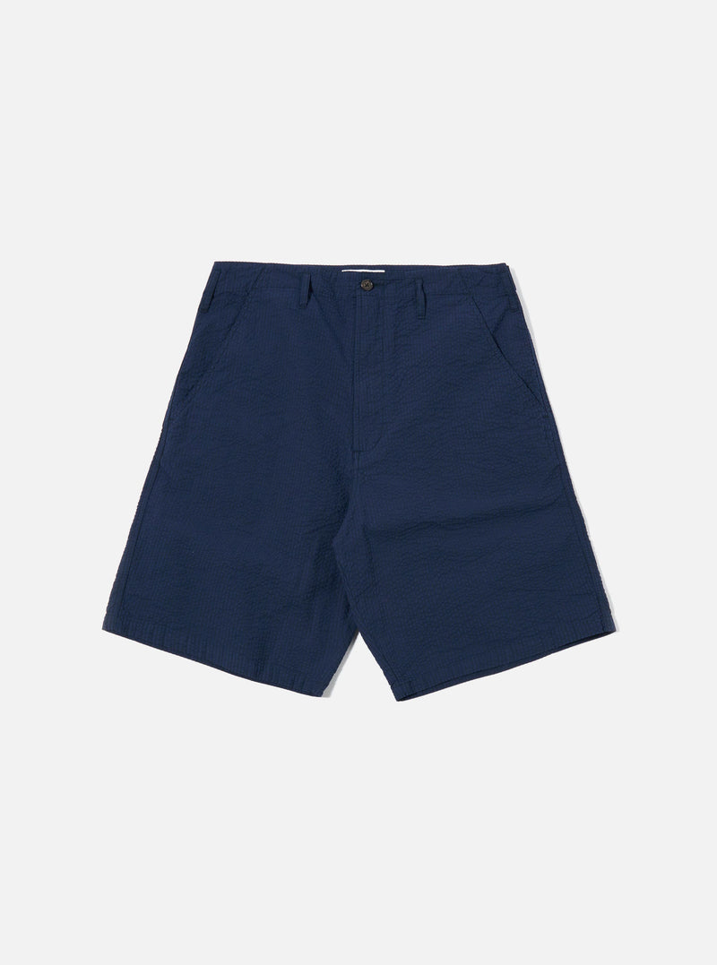 The Navy Derby Stripe Clean Short is shown as a flat lay against a plain white background. The shorts feature a vertical navy and white stripe pattern, an elasticated waistband with a drawstring, and side pockets.