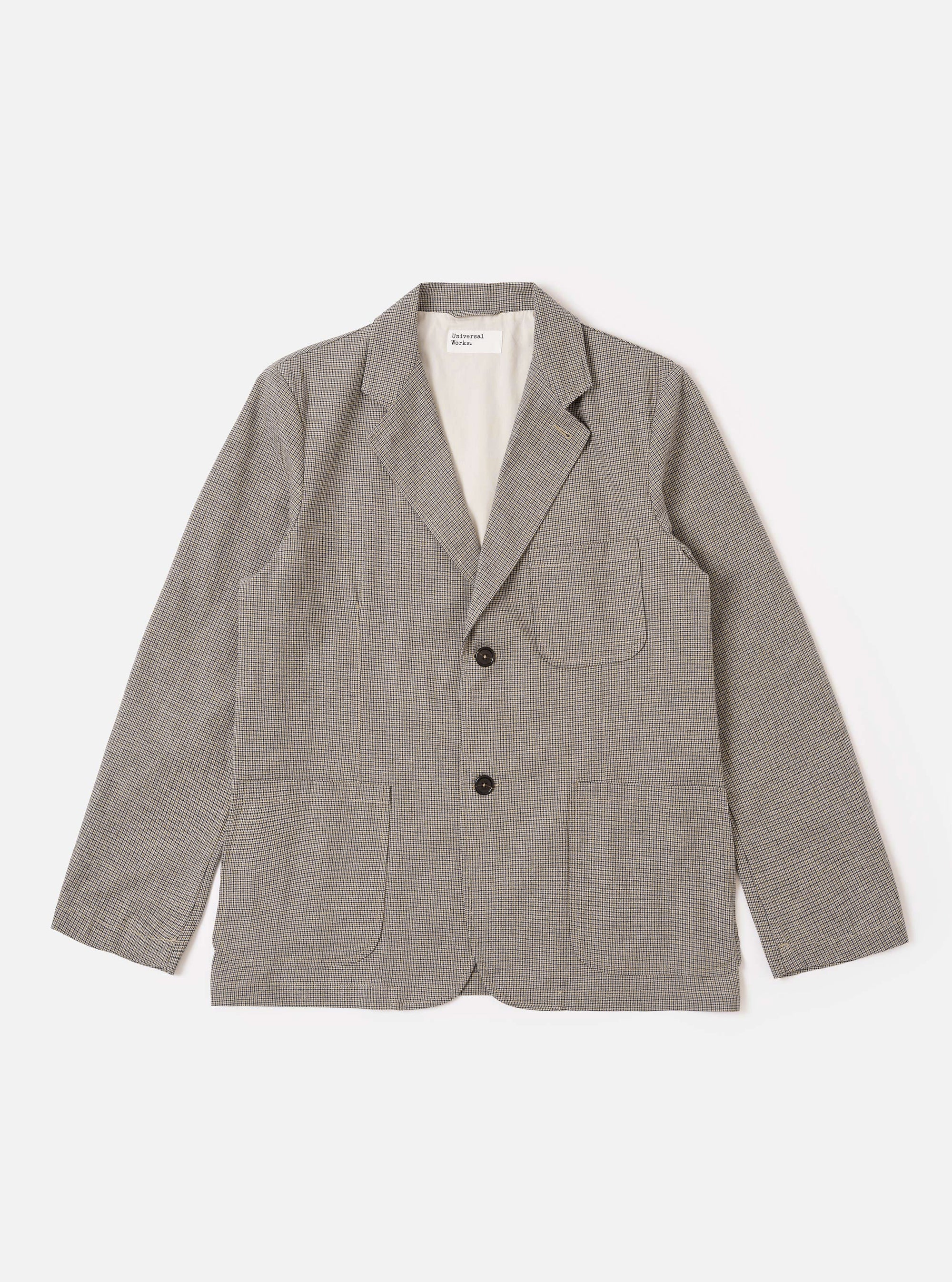The Multi Lucas Cotton Mix Two Button Jacket is shown as a flat lay against a white background. The jacket features a two-button front closure, a wide lapel, and three front patch pockets, including one at the chest and two at the waist. The fabric has a multi-colored check pattern with visible cotton and linen textures.