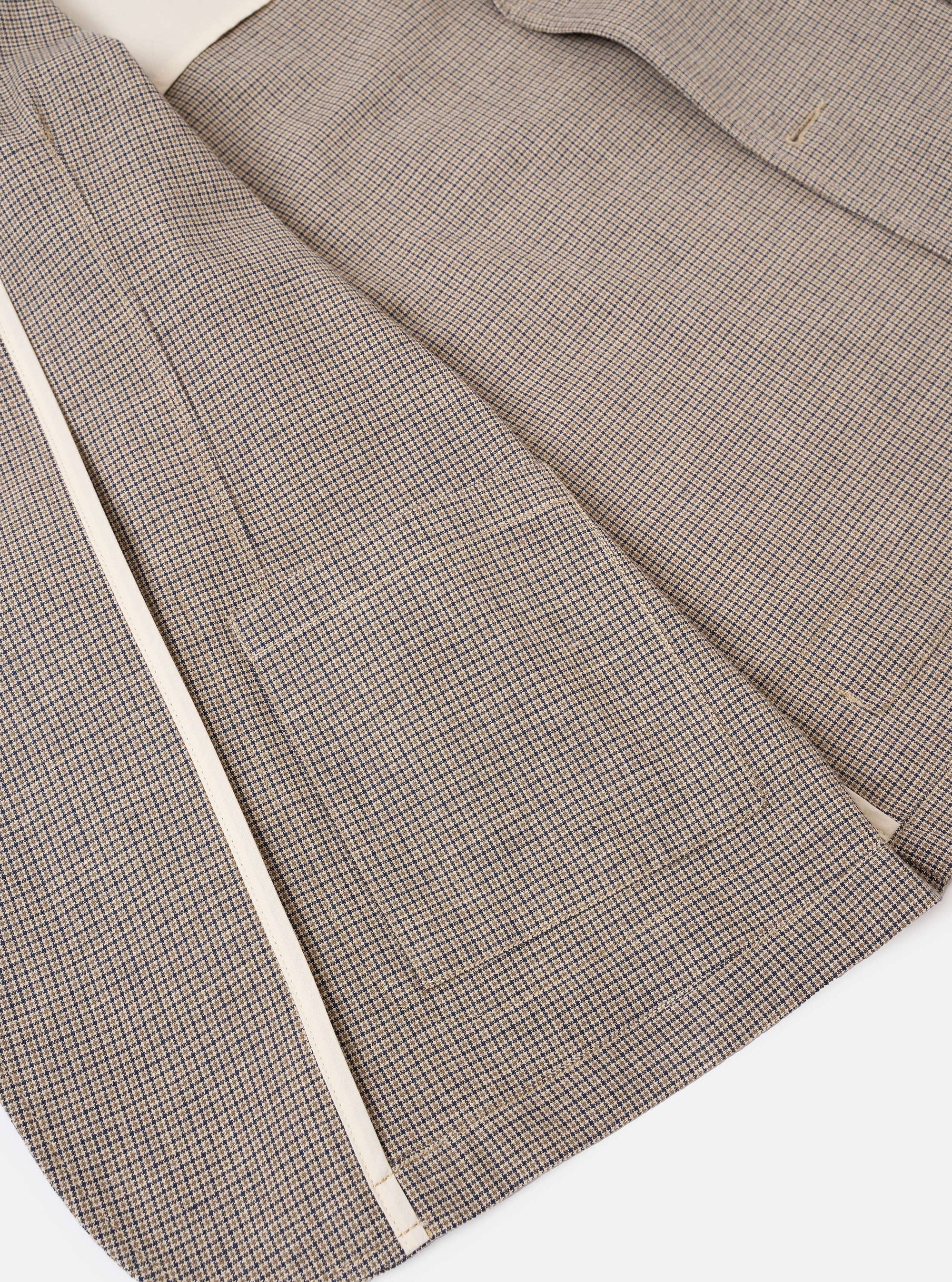 The Multi Lucas Cotton Mix Two Button Jacket is shown in a detail view as a flat lay against a plain white background. The image highlights the textured multi-colored check pattern of the cotton-linen mix fabric and the construction of the garment's patch pocket.