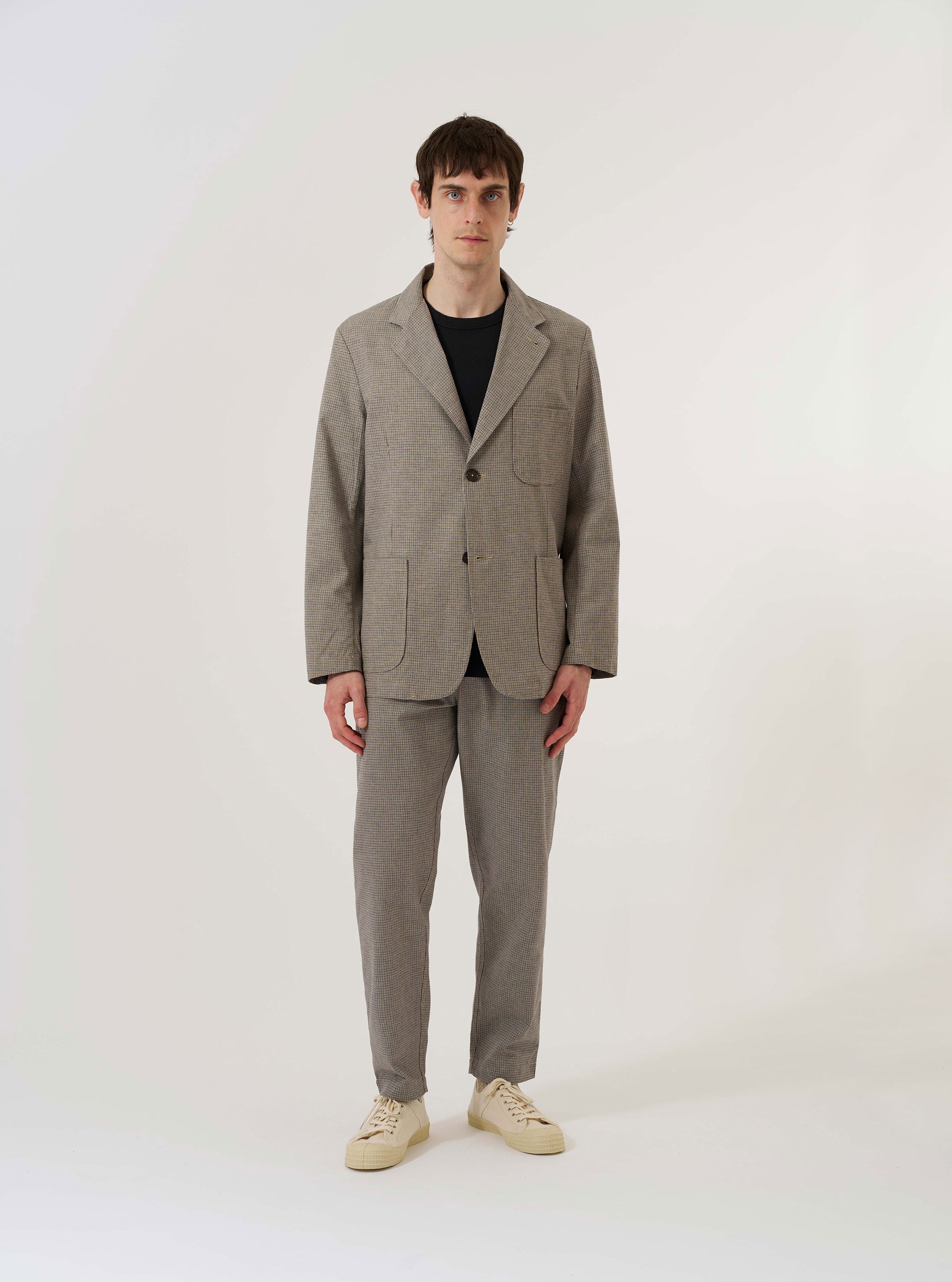 The Multi Lucas Cotton Mix Two Button Jacket is displayed as a flat lay against a plain white background. The jacket features a multi-colored check pattern, a two-button front closure, and a long, wide lapel. It includes two lower patch pockets and one patch pocket on the left chest.