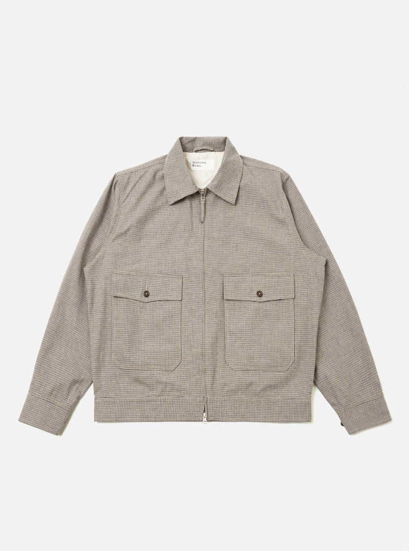 The Multi Lucas Cotton Mix E130 Jacket is shown as a flat lay against a white background. The jacket features a vibrant multi-colored check pattern, a two-way central zip closure, and two large patch pockets at the waist. It has a structured collar and buttoned cuffs.