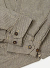 The Multi Lucas Cotton Mix E130 Jacket is shown from the back as a flat lay against a plain white background. The image highlights the colorful check pattern, the straight hem with adjustable waist tabs, and the simple construction of the rear panel including tonal elbow patches.