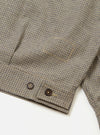 The Multi Lucas Cotton Mix E130 Jacket is shown from the back in a detail shot against a plain white background. The image highlights the adjustable button waist tabs and the textured multi-colored check pattern of the fabric.