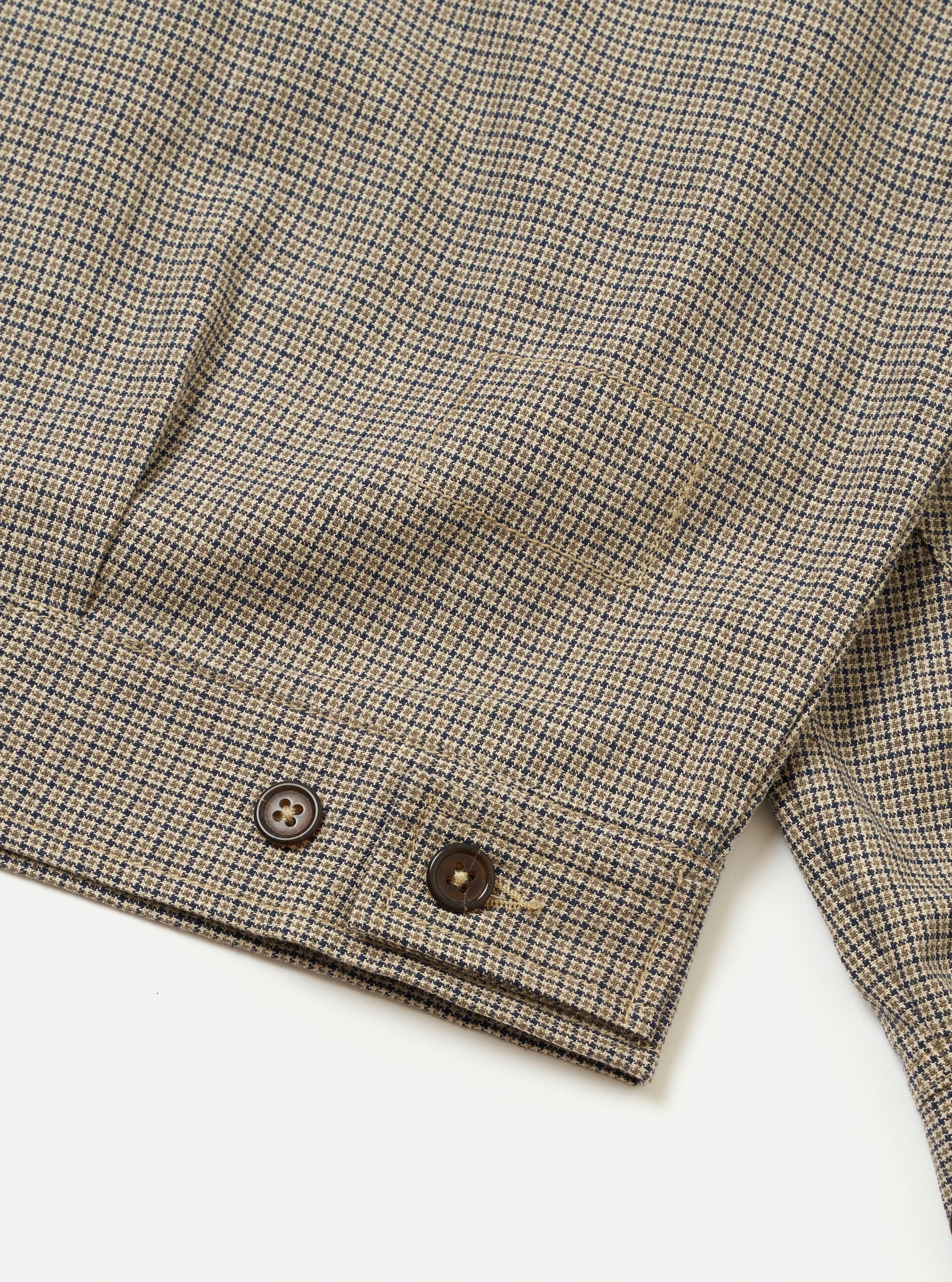 The Multi Lucas Cotton Mix E130 Jacket is shown from the back in a detail shot against a plain white background. The image highlights the adjustable button waist tabs and the textured multi-colored check pattern of the fabric.