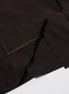 The Licorice Summer Canvas Manor Jacket is shown as a flat lay against a white background. The jacket is a double-breasted blazer with six buttons, two lower patch pockets, and a welt chest pocket. The canvas material has a suede-like texture in a dark brown licorice color.