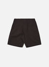 The Licorice Summer Canvas Clean Short is displayed as a flat lay against a plain white background. These dark brown shorts feature a structured waistband with belt loops, a button-front closure, and slanted side pockets. The cotton canvas fabric has a smooth, durable appearance with visible stitching along the seams and hem.