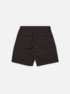 The Licorice Summer Canvas Clean Short is shown from the back as a flat lay against a plain white background. The shorts are a dark brown color and feature a visible elasticated waistband and two large rear patch pockets. The cotton canvas fabric has a smooth, durable appearance with visible stitching details.