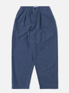 The Blue Sintra Recycled Cotton Oxford Pant is shown as a flat lay against a plain white background. The trousers feature a wide-leg silhouette, a pleated front, and an elasticated waistband with a matching blue drawstring. The fabric is a solid blue recycled cotton blend with a smooth finish.