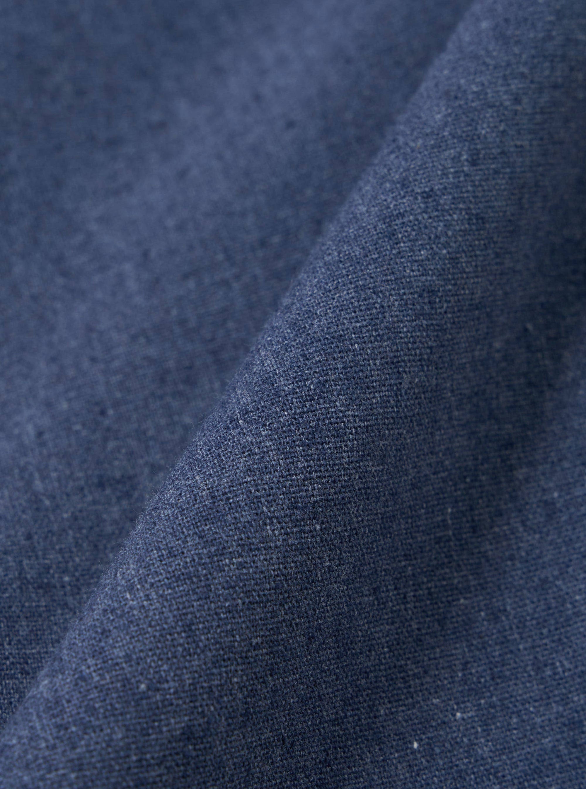A close-up swatch image of the Blue Sintra Recycled Cotton Oxford Pant fabric. The image focuses on the blue cotton material, highlighting its fine weave texture and consistent color. The background is neutral.