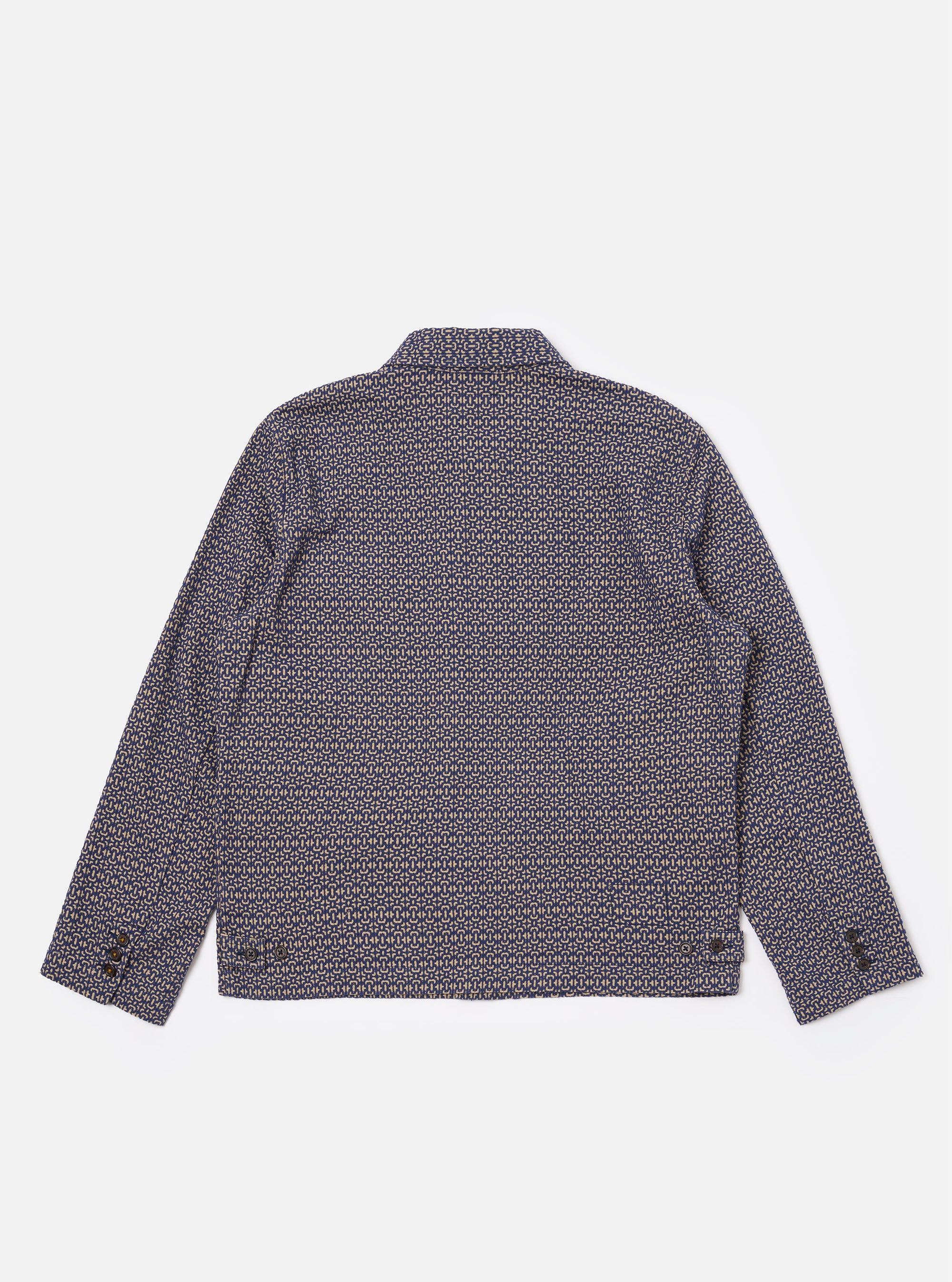 The Navy Konos Cotton Warmus Jacket is shown from the back as a flat lay against a plain white background. The image highlights the jacket’s straight hem, simple back panel construction, and the subtle texture of the navy blue cotton fabric.