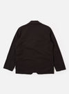 The Licorice Summer Canvas Two Button Jacket is shown as a flat lay against a white background. The jacket features a notched lapel, two-button front closure, a single welt chest pocket, and two large patch pockets at the waist. The fabric is a solid dark brown cotton canvas with a visible fine-grained texture.