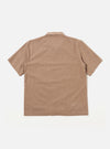 A model wears the Brown Sido Linen Mix Road Shirt against a plain white background. The shirt features a relaxed camp collar, a button-down front, and a single patch pocket on the left chest. The garment is shown in a brown textured linen-blend fabric with short sleeves.