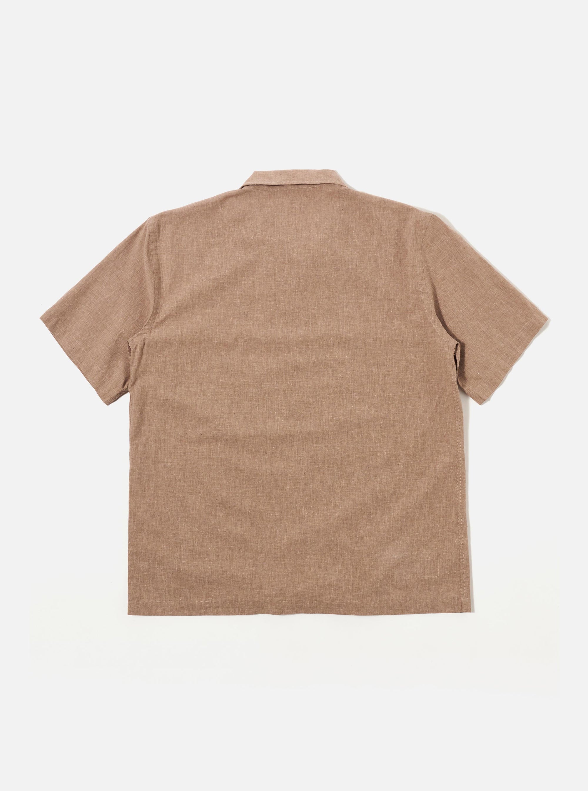 A model wears the Brown Sido Linen Mix Road Shirt against a plain white background. The shirt features a relaxed camp collar, a button-down front, and a single patch pocket on the left chest. The garment is shown in a brown textured linen-blend fabric with short sleeves.