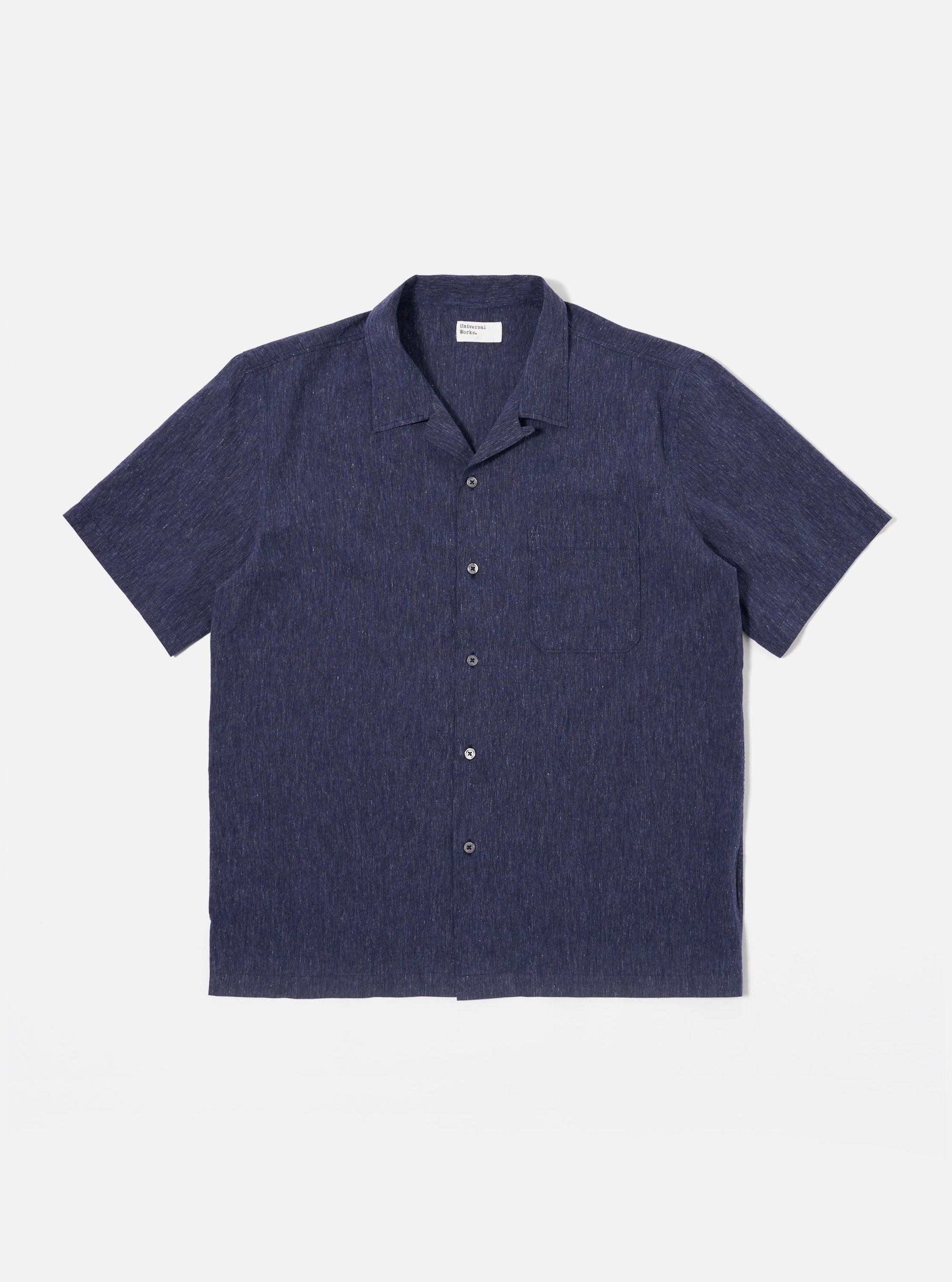 The Navy Sido Linen Mix Road Shirt is presented as a flat lay against a white background. The short-sleeved shirt features a one-piece camp collar with loop closure, a single chest patch pocket, and a button-down front.