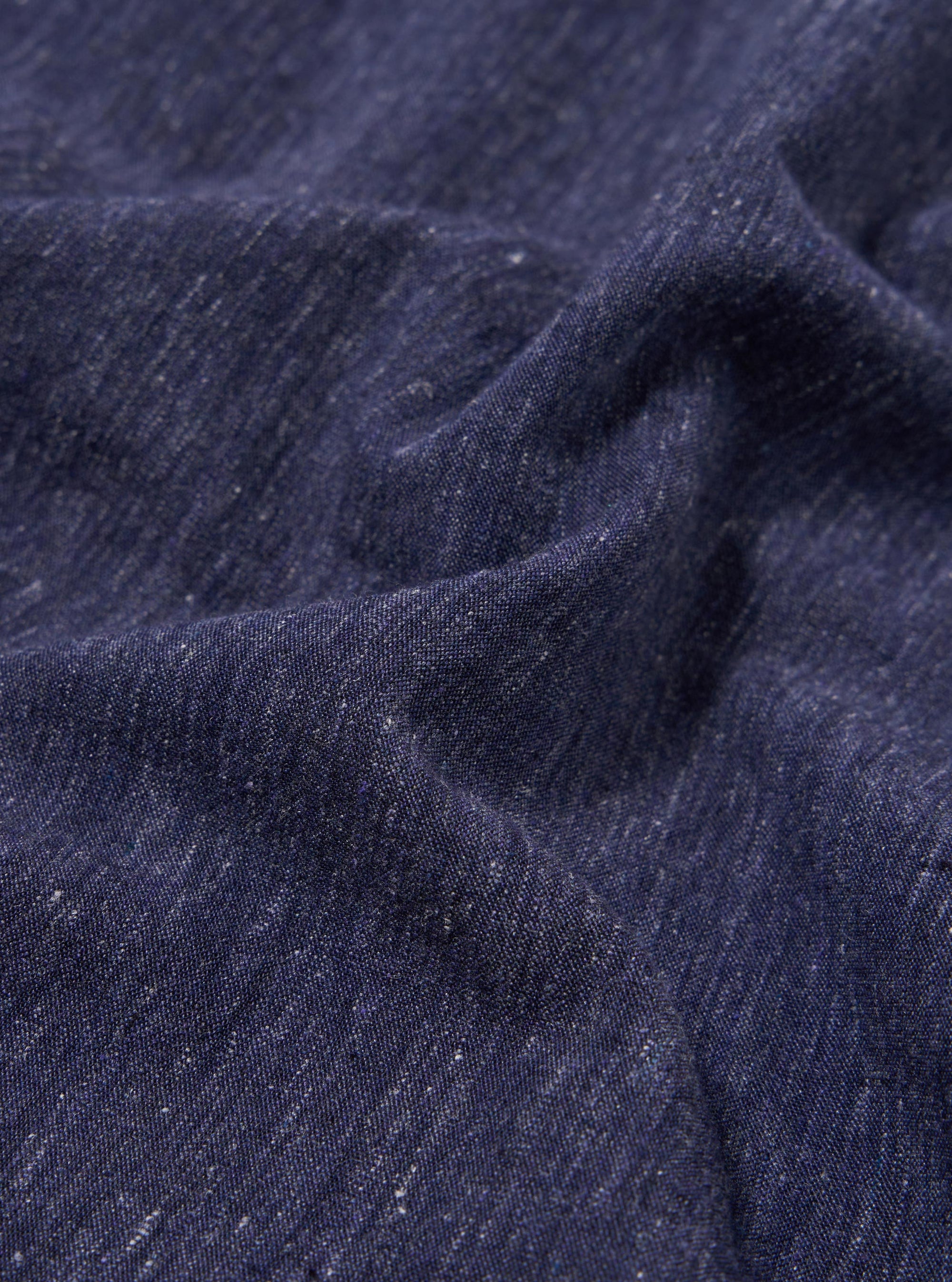 A close-up fabric swatch of the Navy Sido Linen Mix Road Shirt is shown, highlighting the textured weave and deep navy blue color of the cotton-linen blend fabric.