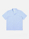 The Sky Blue Sido Linen Mix Road Shirt is shown as a flat lay against a plain white background. The shirt features a camp collar, a central button-down front with tonal buttons, and a single patch pocket on the left chest. The fabric is a lightweight sky blue cotton-linen blend with a subtle texture.