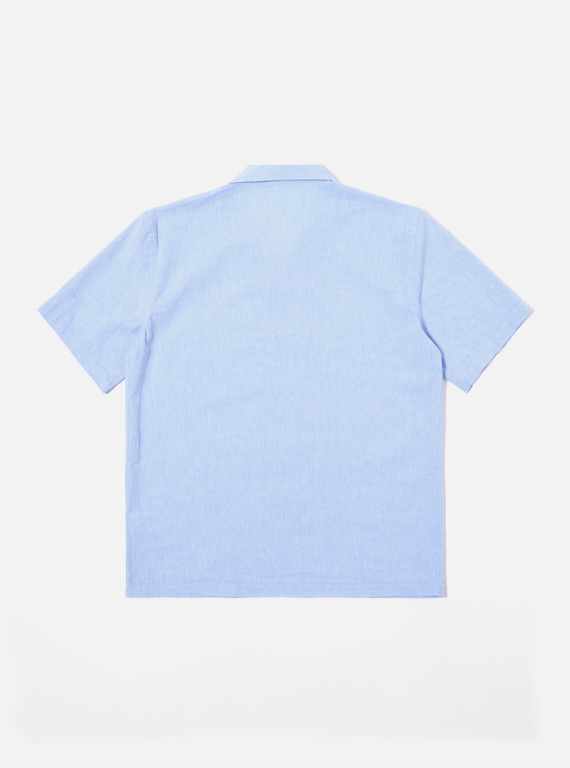 The Sky Blue Sido Linen Mix Road Shirt is shown from the back as a flat lay against a plain white background. The image highlights the clean construction of the garment's rear panel, featuring a straight hem and a simple back yoke. The light sky blue fabric has a visible linen-mix texture.