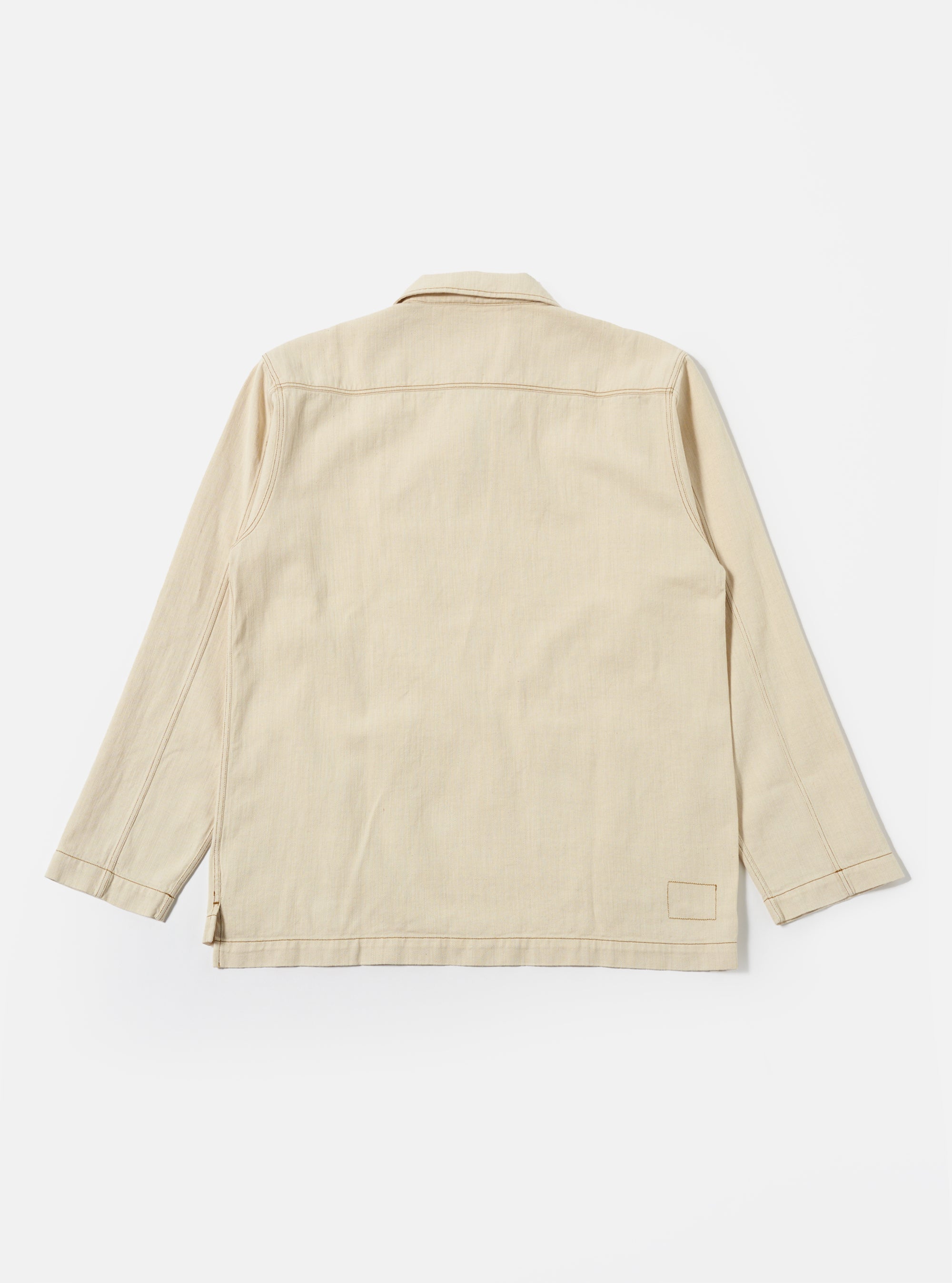 The Ecru Koko Cotlin Smock Overshirt is shown from the back as a flat lay against a plain white background. The image highlights the clean construction of the rear panel, the simple neckline, and the straight hem. The fabric is a light ecru cotton and linen blend with a smooth texture.