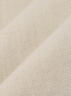A close-up fabric swatch of the Ecru Koko Cotlin S/S Fatigue Shirt highlights the light cream, ecru color and the textured weave of the cotton-linen material. The fabric detail is shown against a neutral background, with no model or mannequin present in the image.