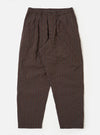 The Brown Chester Stripe Oxford Pant is shown as a flat lay against a plain white background. The trousers feature a loose, wide-leg fit with a pleated front and a comfortable drawstring waistband. The fabric is a brown cotton with a subtle, fine vertical stripe pattern.