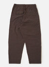 The Brown Chester Stripe Oxford Pant is shown from the back as a flat lay against a plain white background. The trousers feature a vertical brown stripe pattern throughout and an elasticated waistband. A single rear patch pocket is visible on the right side.