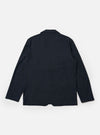 The Navy Valencia Cotton Two Button Jacket is shown from the back as a flat lay against a plain white background. The image highlights the jacket's clean construction, featuring a central vertical seam and a single vent at the hem. The navy blue cotton fabric has a smooth, matte finish.