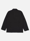 The Black Merida Seersucker Three Button Jacket is shown from the back as a flat lay against a plain white background. The image highlights the jacket's structured back panel, central vent at the hem, and the subtle puckered texture of the black seersucker fabric.