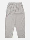 The Grey Izumi Cotton Oxford Pant is shown as a flat lay against a white background. The trousers feature a wide, loose leg with a single pleat at the front and an elasticated waistband with a drawstring. Two front pockets and a button fly are visible. The fabric is a solid grey cotton.