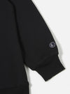 The Black Recycled Cotton Blend Jersey Loose Sweatshirt is shown from the back as a flat lay against a plain white background. The image highlights the sweatshirt's relaxed fit, dropped shoulders, and ribbed detailing at the collar, cuffs, and hem. The garment is made from a solid black recycled cotton blend jersey with a smooth finish.