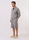 The Grey Marl Recycled Cotton Blend Jersey Tyler Jacket is shown as a flat lay against a white background. The jacket features a full-length two-way silver zipper, a self-fabric collar, and ribbed cuffs and hem. A single patch pocket with a vertical opening is visible on the chest, along with two side seam pockets. The fabric has a textured grey marl appearance.