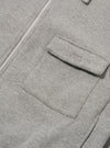 The Grey Marl Recycled Cotton Blend Jersey Tyler Jacket is shown from the back as a flat lay against a plain white background. The image highlights the jacket's simple rear construction, the soft grey marl texture of the jersey fabric, and the ribbed hem and cuffs.