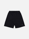 The Black Recycled Cotton Blend Jersey Vacation Short is shown as a flat lay against a plain white background. The shorts feature an elasticated waistband with a matching drawstring and two large patch pockets on the front. The black jersey fabric has a soft, matte finish.