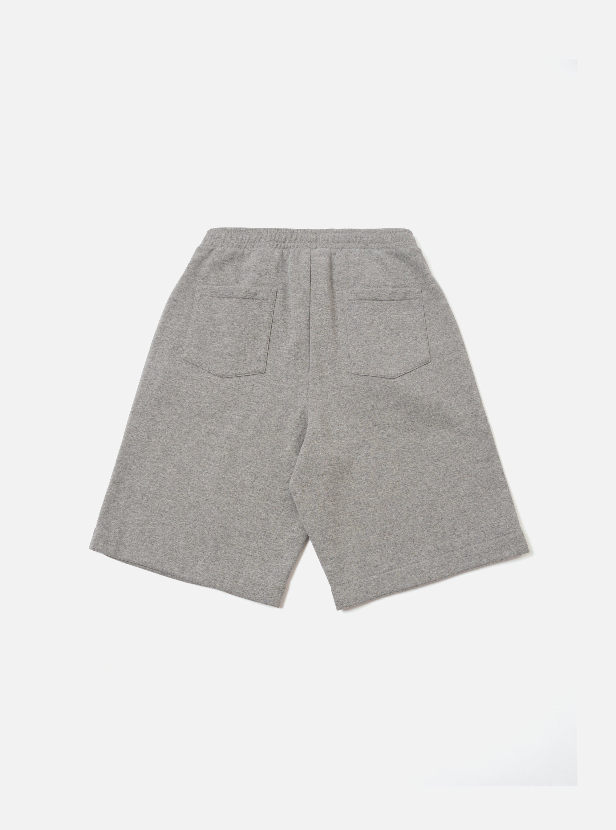 The Grey Marl Recycled Cotton Blend Jersey Vacation Short is shown from the back as a flat lay against a plain white background. The image highlights the single rear patch pocket and the elasticated waistband of the light grey marl garment.