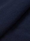 A close-up swatch image of the Bright Navy Piquet Vacation Polo shows the detailed texture of the navy blue piquet cotton fabric. The weave of the material is clearly visible, and