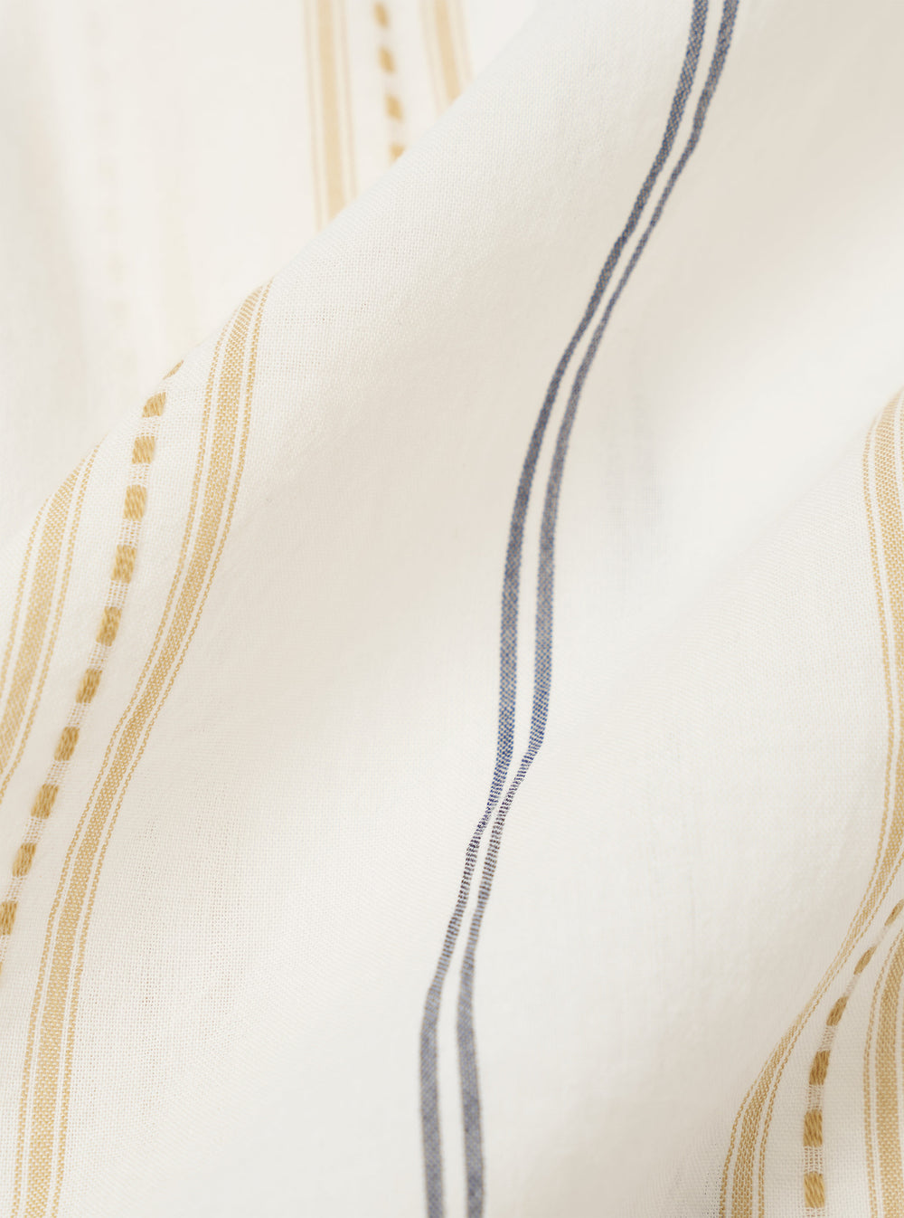 A close-up swatch image of the Ecru/Navy/Sand Hendrix Stripe Square Pocket Shirt fabric. The image highlights the fine gauge, semi-sheer cotton material featuring vertical stripes in ecru, navy, and sand. The texture of the weave is clearly visible.