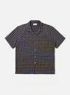 The Navy/Sand Rhodes 8 Cotton Road Shirt is shown as a flat lay against a white background. The shirt features a relaxed camp collar, a central button-down front, and short sleeves. The fabric is decorated with a patterned design in navy and sand colors.
