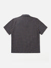 The Navy/Sand Rhodes 8 Cotton Road Shirt is shown from the back as a flat lay against a plain white background. The shirt features a straight hem, short sleeves, and a clean back panel with a central hanging loop at the neck. The fabric has a distinct textured pattern in navy and sand tones.