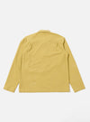 The Yellow Mykonos Cotton Zip Shirt is shown from the back as a flat lay against a plain white background. The image highlights the clean, simple construction of the shirt's rear panel and the bright yellow textured cotton fabric.