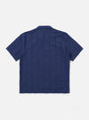 The Blue Maui Cotton Road Shirt is shown from the back as a flat lay against a white background. The shirt features a straight hem with small side splits and a single-piece collar. The fabric has a distinct vertical stripe pattern in shades of blue and navy.