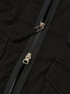 The Black Kelly Cotton Glider Jacket is shown as a flat lay against a white background. The jacket features two large flap chest pockets, a button-down front, and a classic pointed collar. The fabric has a smooth, solid black cotton finish with visible stitching details.