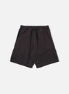 The Licorice Lyo Linen Mix Simple Short is presented as a flat lay against a plain white background. The shorts feature an elasticated waistband with a matching drawstring, slanted side pockets, and a clean, straight-leg silhouette. The fabric has a subtle, natural texture characteristic of a linen blend.