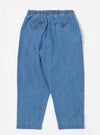 The Washed Indigo 8oz Slub Denim Oxford Pant is shown from the back as a flat lay against a plain white background. The image highlights the elasticated waistband and two rear patch pockets. The washed indigo denim fabric features a distinct slubby texture with visible white highlights.
