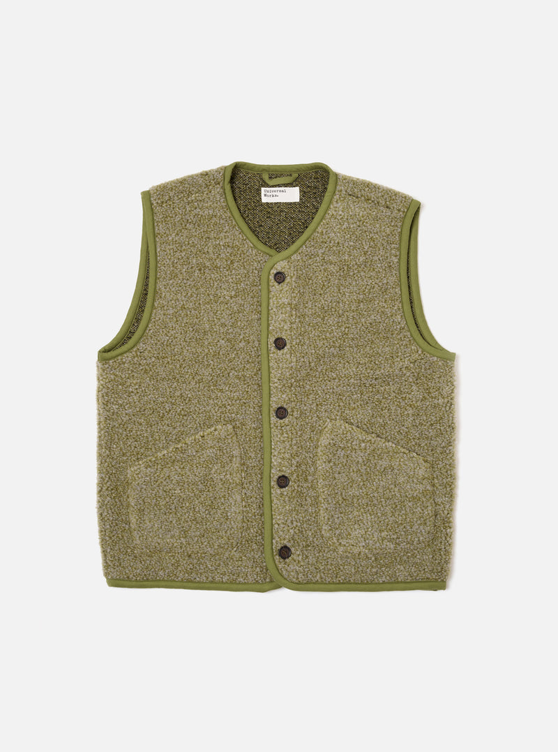 The Light Olive Alvar Fleece Lancaster Gilet is presented as a flat lay against a plain white background. The sleeveless garment is made from a textured light olive fleece and features a rounded shawl collar, a central five-button closure, and three patch pockets: one on the chest and two at the waist.